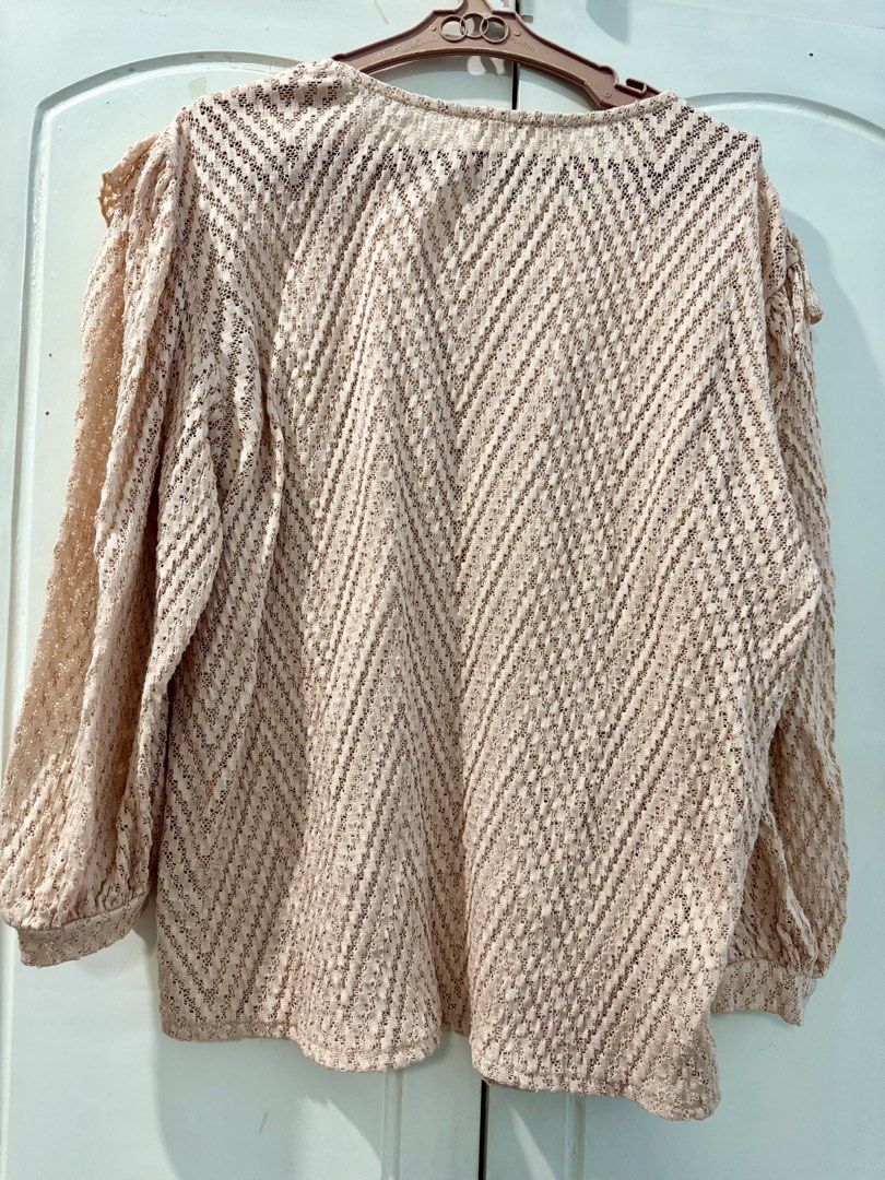 MNG Beige Crochet Long Sleeve Top (Category: Longsleeves) located in Manila. Submitted by melissaal82890 (Listing ID 1464587173, Image 2). Description: - Beige crochet top from MNG - Long sleeves with ruffled shoulder detail - Chevron pattern throughout - Perfect for layering or wearing solo - Ideal for casual or dressed-up occasions.