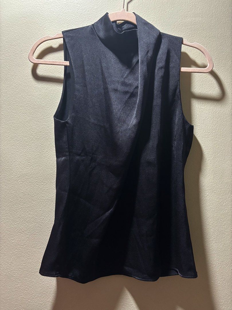 Mango Black Sleeveless Mock Neck Top (Category: Sleeveless) located in Makati City. Submitted by secondstory222 (Listing ID 1464570903, Image 1). Description: - Black sleeveless - Mock neck style - Satin-like material - Asymmetrical scarf mock neck .
