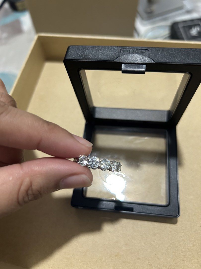 Moissainite Diamond Eternity Band Ring S925 (Category: Rings) located in Lucena. Submitted by brightmountain.a0a9f1 (Listing ID 1464701152, Image 2). Description: - Style: Classic full eternity band (size 7) - Stones: Sparkling round brilliant cut stones all around - Setting: Secure prong setting for maximum light reflection - Fit: Comfortable for everyday wear - Inclusion: Comes with a clear suspension display box as pictured.