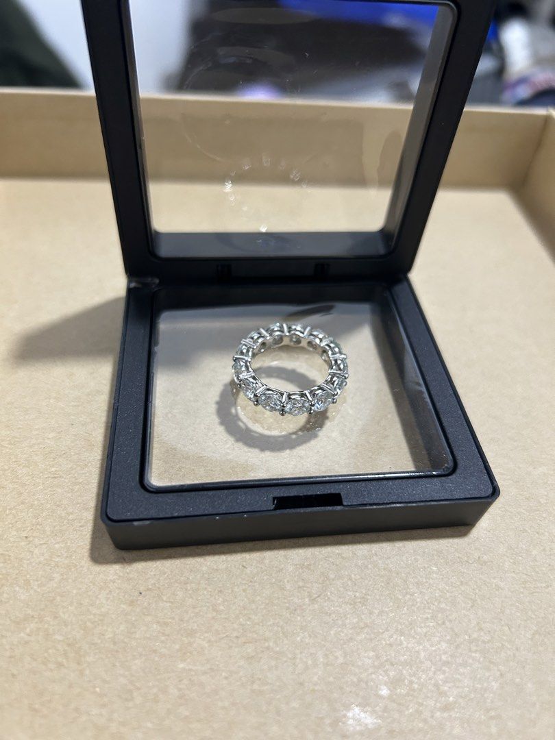 Moissainite Diamond Eternity Band Ring S925 (Category: Rings) located in Lucena. Submitted by brightmountain.a0a9f1 (Listing ID 1464701152, Image 1). Description: - Style: Classic full eternity band (size 7) - Stones: Sparkling round brilliant cut stones all around - Setting: Secure prong setting for maximum light reflection - Fit: Comfortable for everyday wear - Inclusion: Comes with a clear suspension display box as pictured.