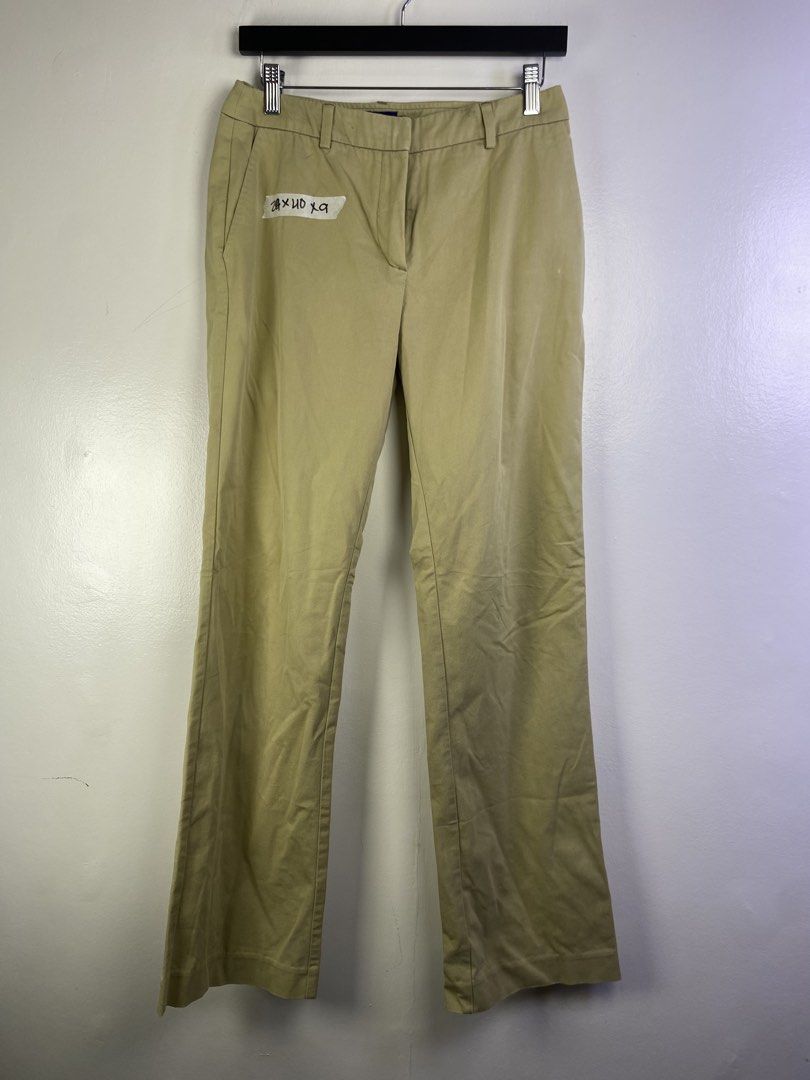 Moncler Khaki Bootcut Dress Pants (Category: Jeans) located in Manila. Submitted by declutterpromax (Listing ID 1464601130, Image 1). Description: - Classic khaki bootcut dress pants - Ideal for work or smart casual occasions - Features a fabric with a nice drape - Minor marks present, as shown in the last few photos.