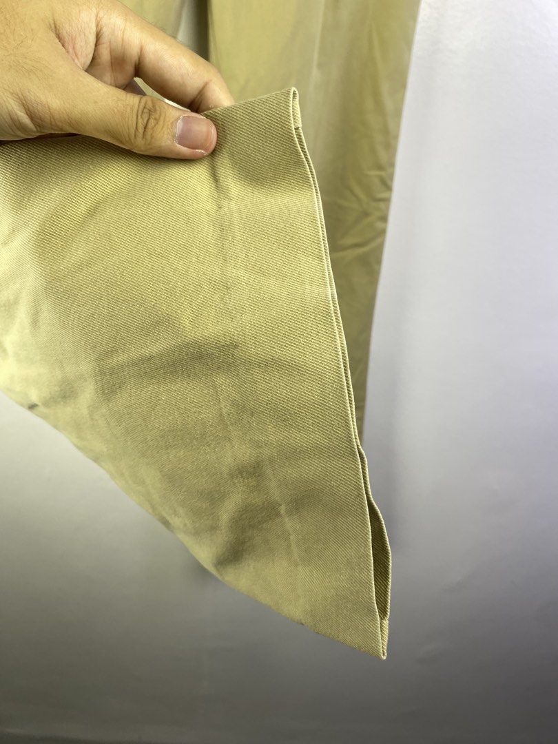 Moncler Khaki Bootcut Dress Pants (Category: Jeans) located in Manila. Submitted by declutterpromax (Listing ID 1464601130, Image 2). Description: - Classic khaki bootcut dress pants - Ideal for work or smart casual occasions - Features a fabric with a nice drape - Minor marks present, as shown in the last few photos.