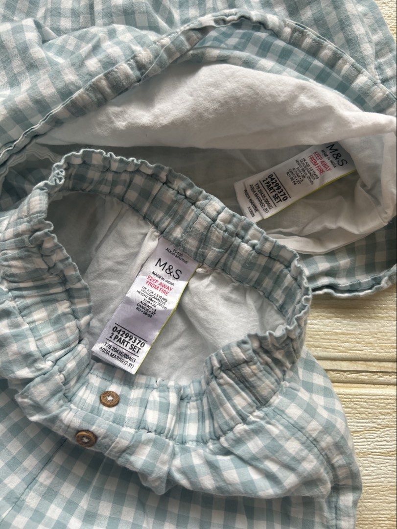 M&S (Marks & Spencer) two-piece coordinates set (Category: Babies & Kids Fashion) located in Cebu City. Submitted by yjainani (Listing ID 1464596549, Image 3). Description: M&S (Marks & Spencer) two-piece coordinates set featuring a green-and-white sage gingham design.