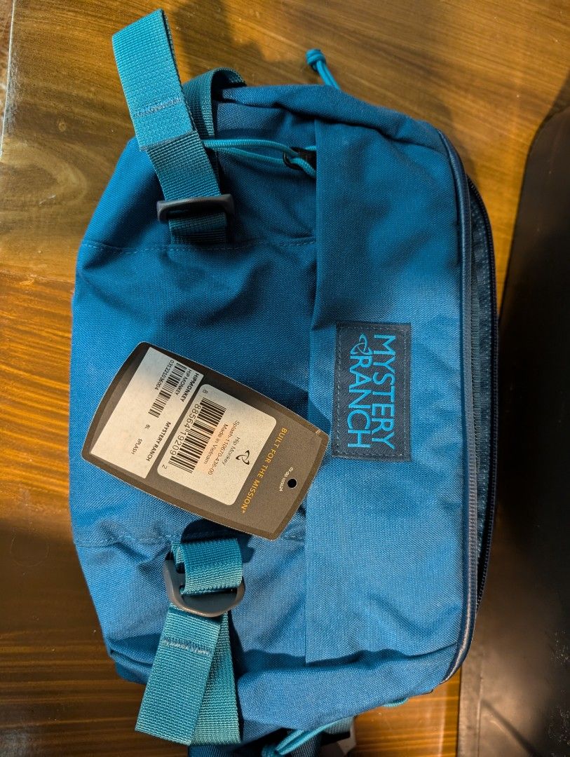 Mystery Ranch Hip Monkey (Category: Belt bags, Clutches and Pouches) located in Naga. Submitted by kenshin78 (Listing ID 1464731986, Image 1). Description: - Brand: Mystery Ranch Hip Monkey - Capacity: 8 litres (fits EDC gear, water bottles, or a 6-pack) - Versatile wear: Can be worn around the waist or as a crossbody bag - Comfort: Features a padded back panel for all-day support - Condition: good as new with original product tag attached - 100%