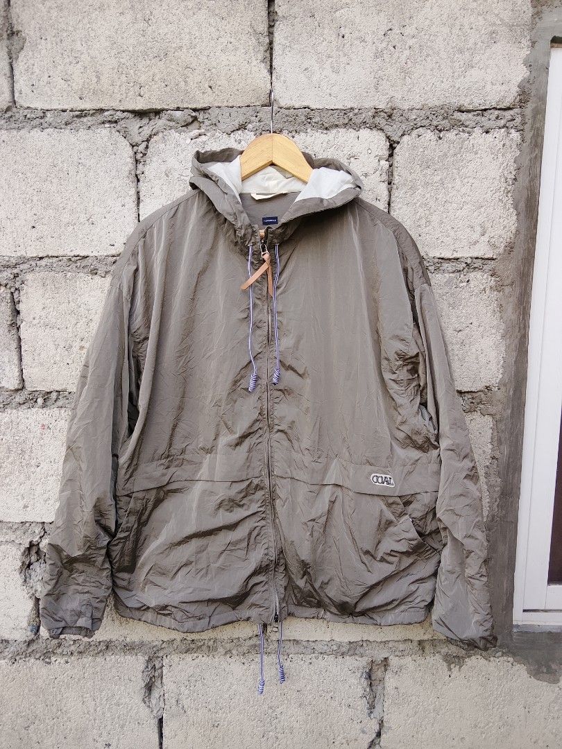 Nanamica zip up jacket made in japan (Category: Luxury Apparel) located in Bayombong. Submitted by jeffreybee (Listing ID 1464764708, Image 2). Description: 28 length x 26 width no flaws ~~taupe nanamica Zip Up Wind Parka featuring a lightweight recycled nylon construction, an adjustable drawstring hood and hem, and a subtle "COAL" chest logo..