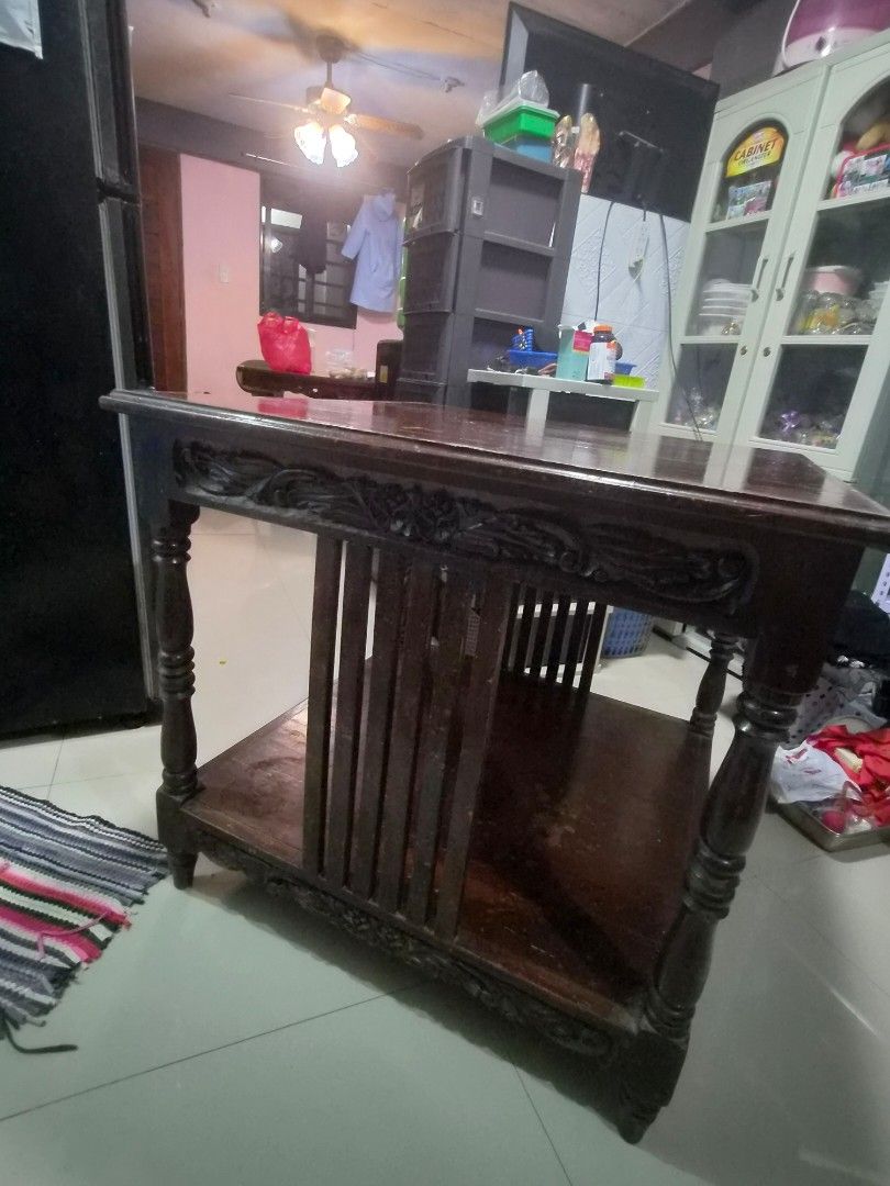 Narra_Antique Wooden Table with Carvings (Category: Tables & Sets) located in Caloocan City. Submitted by grandflower.2c6677 (Listing ID 1464670077, Image 2). Description: - Vintage wooden coffee table - Features intricate carvings on the sides - Sturdy legs for stability - Adds character and charm to any living room - Pickup only RFS: not using it anymore still negotiable.