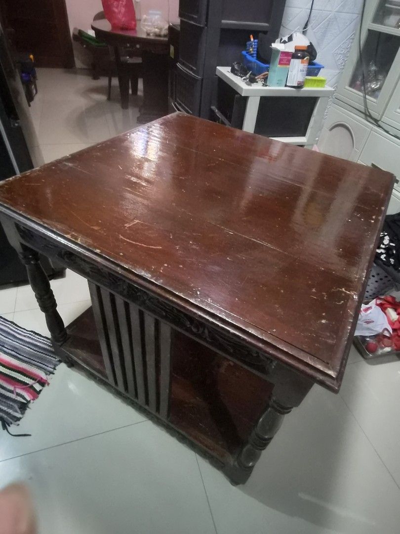 Narra_Antique Wooden Table with Carvings (Category: Tables & Sets) located in Caloocan City. Submitted by grandflower.2c6677 (Listing ID 1464670077, Image 3). Description: - Vintage wooden coffee table - Features intricate carvings on the sides - Sturdy legs for stability - Adds character and charm to any living room - Pickup only RFS: not using it anymore still negotiable.