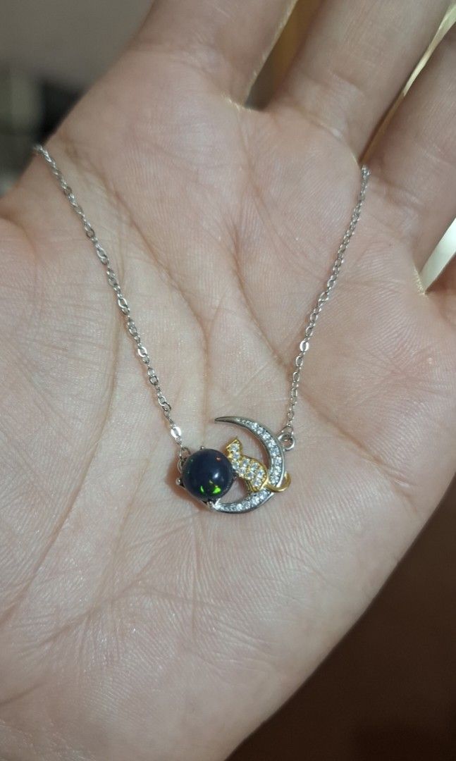 Natural Black Opal Necklace (Category: Necklaces) located in Baguio. Submitted by marinel.caranto (Listing ID 1464637509, Image 3). Description: 2850.00 only natural opal beautiful play of color with cert cat and moon design s925 rhodium plated silver.