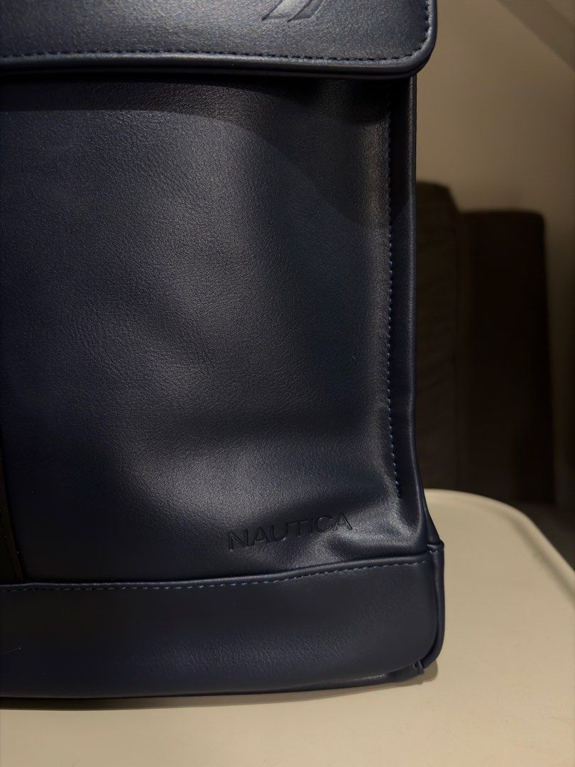 Nautica Navy Blue Leather Backpack (Category: Backpacks) located in Quezon City. Submitted by r_decluttering (Listing ID 1464594021, Image 2). Description: Nautica Leather Backpack Dark Blue With Laptop Sleeve Great for office or casual use Brand new, no issues. Rfs: Gift Height - 14.5 in. Length - 12.5 in. Width (at base) - 5 in..