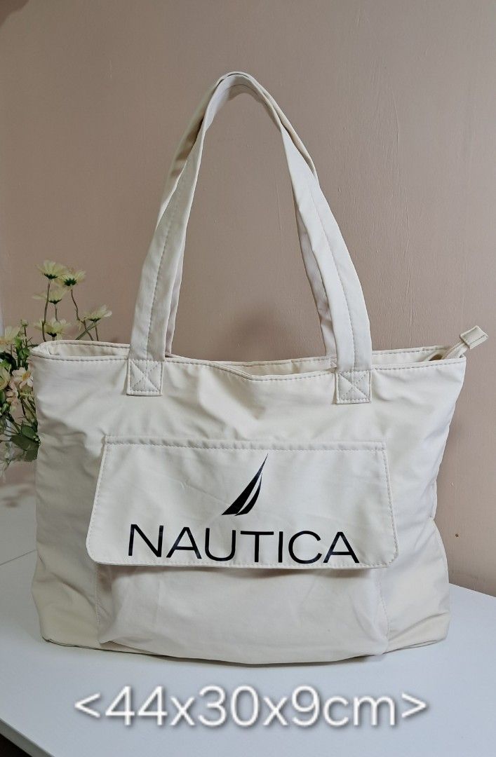Nautica Tote Bag (Category: Tote Bags) located in Zamboanga. Submitted by corneliasbags (Listing ID 1464704002, Image 1). Description: -padded nylon material, thick and durable -malinis na malinis pa po eto, inside out kaya wala po ako masyadong maedetails.
