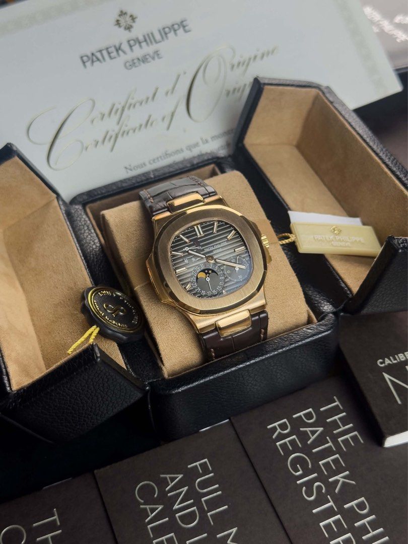 Nautilus 5712R-001 RG (Category: Men's Watches) located in Makati City. Submitted by swissperpetual (Listing ID 1464630076, Image 3). Description: Patek Philippe Nautilus Rose Gold 5712R-001 Leather Strap 40mm 2016 Watch, Certificate, Booklets Setting Pen, & Hang Tag Condition: 9/10 (Excellent Condition) Price: ₱7,788,000 Negotiable 🤝 7 Day Moneyback Guarantee 🧑‍🔧 1 Year SP Service Warranty 💱 Trades Offers and Pre-orders Accepted 💳 Credit Ca