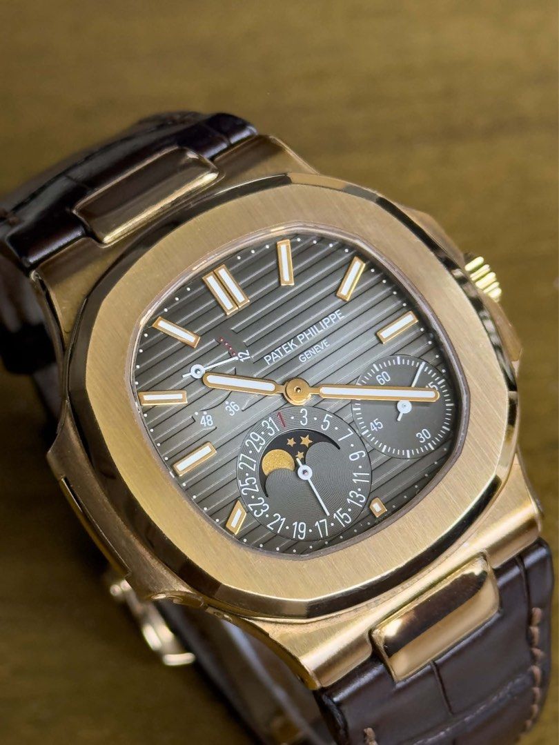 Nautilus 5712R-001 RG (Category: Men's Watches) located in Makati City. Submitted by swissperpetual (Listing ID 1464630076, Image 2). Description: Patek Philippe Nautilus Rose Gold 5712R-001 Leather Strap 40mm 2016 Watch, Certificate, Booklets Setting Pen, & Hang Tag Condition: 9/10 (Excellent Condition) Price: ₱7,788,000 Negotiable 🤝 7 Day Moneyback Guarantee 🧑‍🔧 1 Year SP Service Warranty 💱 Trades Offers and Pre-orders Accepted 💳 Credit Ca