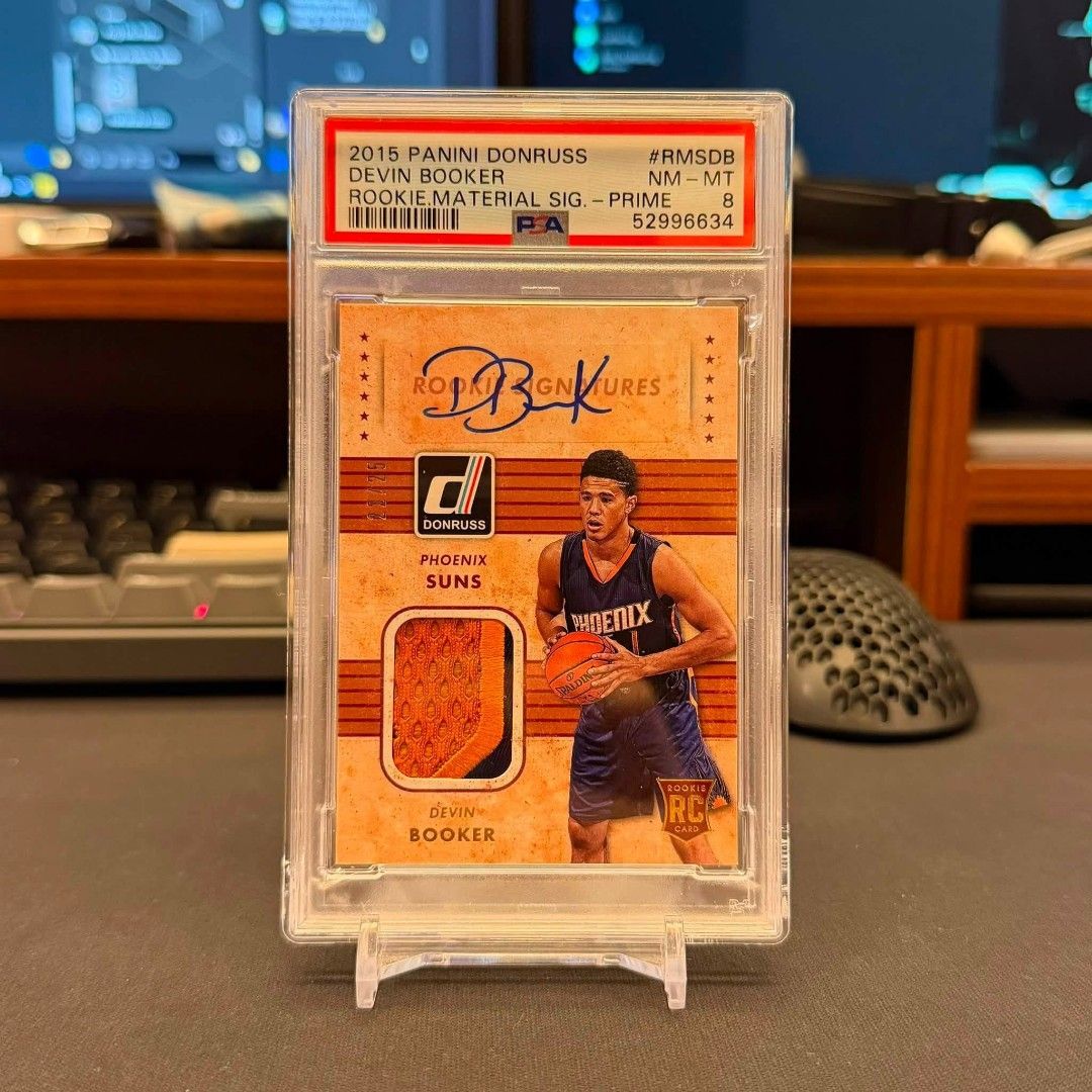 Nba Booker AU's/GU's (Category: Graded Singles) located in Manila. Submitted by blindboxcollectibles (Listing ID 1464574782, Image 1). Description: *booker RC materials patch auto PSA 8 - 38k *booker RC immac auto - 28k *booker RC immac authograph auto - 35k *booker RC hoops auto - 15k *booker RC Noir patch auto BGS 9 - 60k *booker GU's Lot (3 Rc/3non rc) - 13k mop: gcash/bank mod: lalamove loc: cainta.