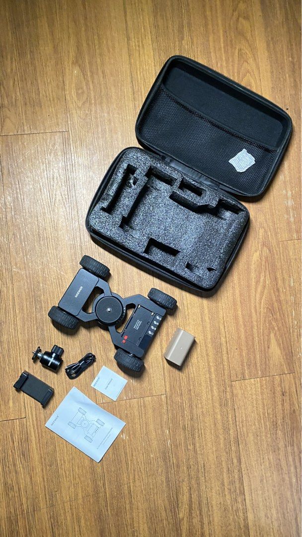 Neewer Electric Motorized Video Dolly with Case (Category: Gimbals & Stabilizers ) located in Makati City. Submitted by igoracm (Listing ID 1464623051, Image 3). Description: - Neewer electric motorized video dolly - Includes: battery, phone mount, ball head adapter, USB cable, user manuals - Comes with a convenient hard case for storage and transport - Achieve smooth, professional video shots - Ready for your next creative project.