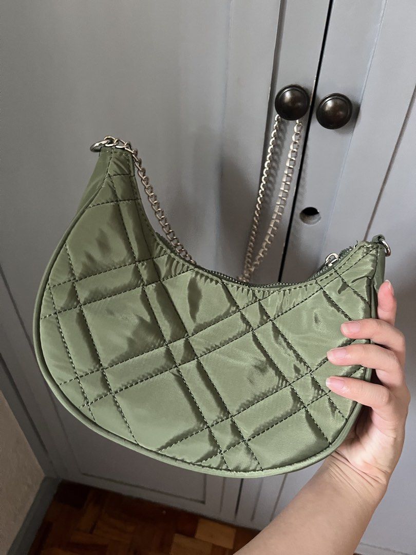 FOREVER 21 Army Green Crescent Bag w/ Silver Hardware (Category: Cross-body Bags) located in Las Pinas. Submitted by limcmc (Listing ID 1464606977, Image 3). Description: ‼️ NEVER USED. ✅ Tag/s RFS: Decluttering MOP: Gcash & BDO (NO REFUNDS) Shipping: Shouldered by the buyer (gogoexpress, j&t, lalamove) ✨ DM me for more inquiries!.