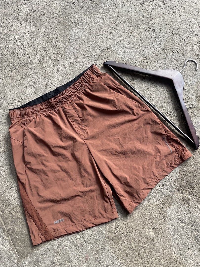 NEPA Brown Athletic Shorts (Category: Shorts) located in Polomolok. Submitted by madagascarts (Listing ID 1464673755, Image 3). Description: - Brand: NEPA - Color: Brown - Style: Athletic Shorts - Features: Elastic waistband with drawstring, two side pockets - Material: Lightweight and breathable - Ideal for: Running, workouts - Details: Small logo on left leg - Fit: Comfortable - 16| 19.
