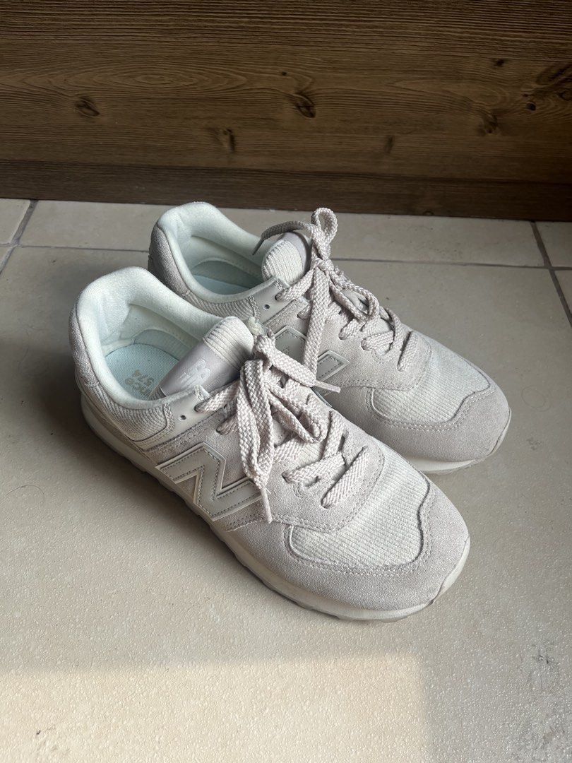 New Balance 574 Sneakers Angora (Category: Sneakers) located in Taguig. Submitted by victoriadl (Listing ID 1464656236, Image 2). Description: - Used less than five times only - Super comfy even for long walks!!! - Reason for selling: too many footwear alr SRP: ₱5,000+ .