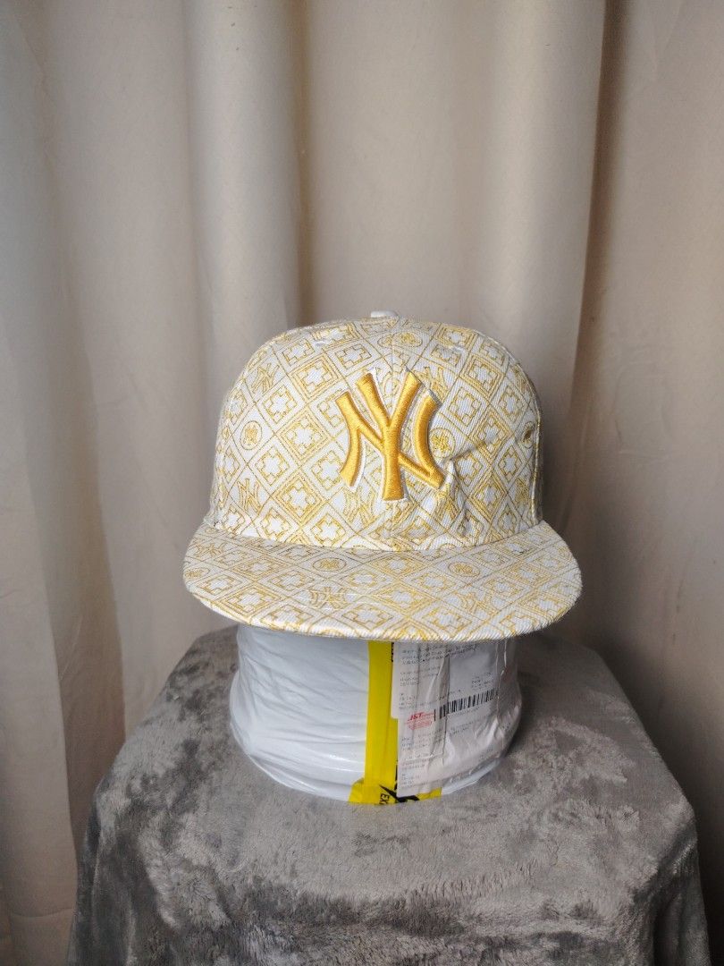 New York Yankees New Era Monogram (Category: Caps & Hats) located in Roxas City. Submitted by hd_thriftshop (Listing ID 1464712240, Image 1). Description: New York Yankees New Era 59FIFTY all-over monogram pattern flat-brim cap with gold and white embroidery.