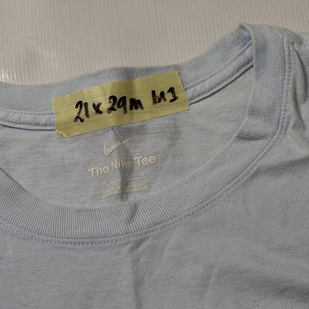 NIKE (Category: Tshirts & Polo Shirts ) located in Manila. Submitted by johnedel_james (Listing ID 1464687213, Image 3). Description: NIKE Size on tag: M Dimes: 21 x 29 ₱350 Condition: Excellent Color rate: 9/10 Issue: None.