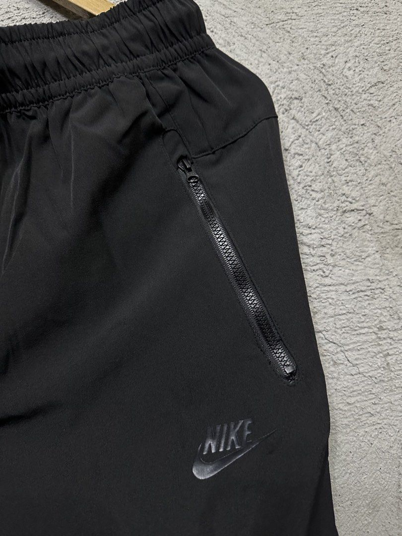 Nike Black Track Pants Joggers Size Medium / Large (Category: Joggers) located in Quezon City. Submitted by stre3tw3ar (Listing ID 1464584571, Image 3). Description: - Black Nike track pants - Size M / L - Elastic waistband with drawstring - Zippered pockets on both sides - Nike logo on the left leg - Made in China.