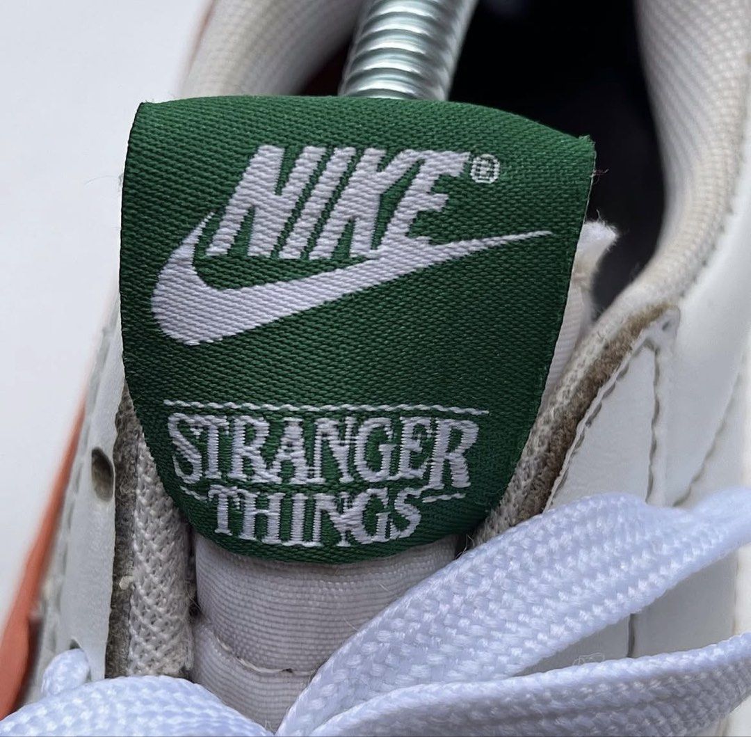Nike Blazer Low Stranger Things Hawkins HS Athletic Dept (Category: Sneakers) located in Antipolo. Submitted by shopanne (Listing ID 1464610544, Image 2). Description: - Nike Blazer Low x Stranger Things Collaboration - Features Hawkins High School Athletic Dept branding - White leather upper with orange Swoosh - Green accent details - Unique design for Stranger Things fans - Toe Vamp Crease PM lang po :) .