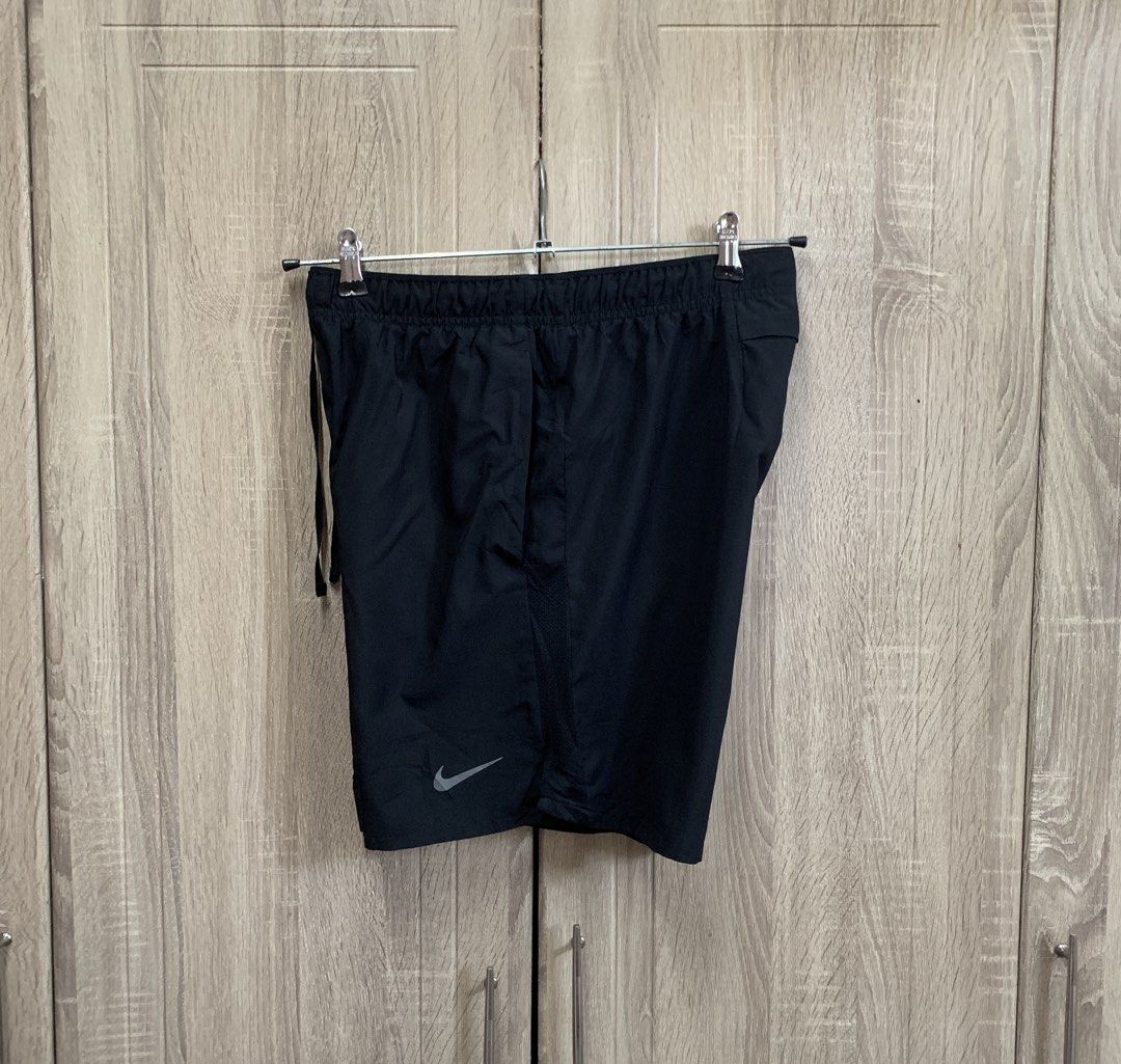 NIKE DRI FIT CHALLENGER RUNNING SHORTS (Category: Activewear) located in Bocaue. Submitted by mndzeey (Listing ID 1464618914, Image 3). Description: NIKE DRI FIT CHALLENGER RUNNING SHORTS Size Medium on tag Fits Large Size 30 to 34 Length -17 Hem -12 As new No issues.
