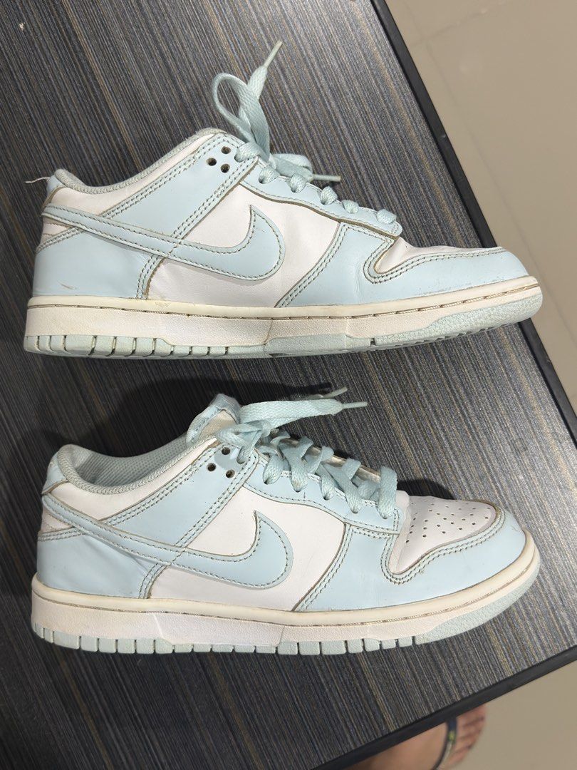 Nike Dunk Low Glacier Blue Size 6Y (Category: Babies & Kids Fashion) located in Cagayan de Oro. Submitted by tristanaceb (Listing ID 1464764172, Image 3). Description: - Model: Nike Dunk Low - Colorway: Glacier Blue and White - Size: Youth 6Y (Equivalent to Women's US 7.5) - Condition: Uppers in solid shape, soles show minor dirt from light wear - Features: Classic leather low-top design, signature swoosh, tonal light blue laces - Authenticity: S