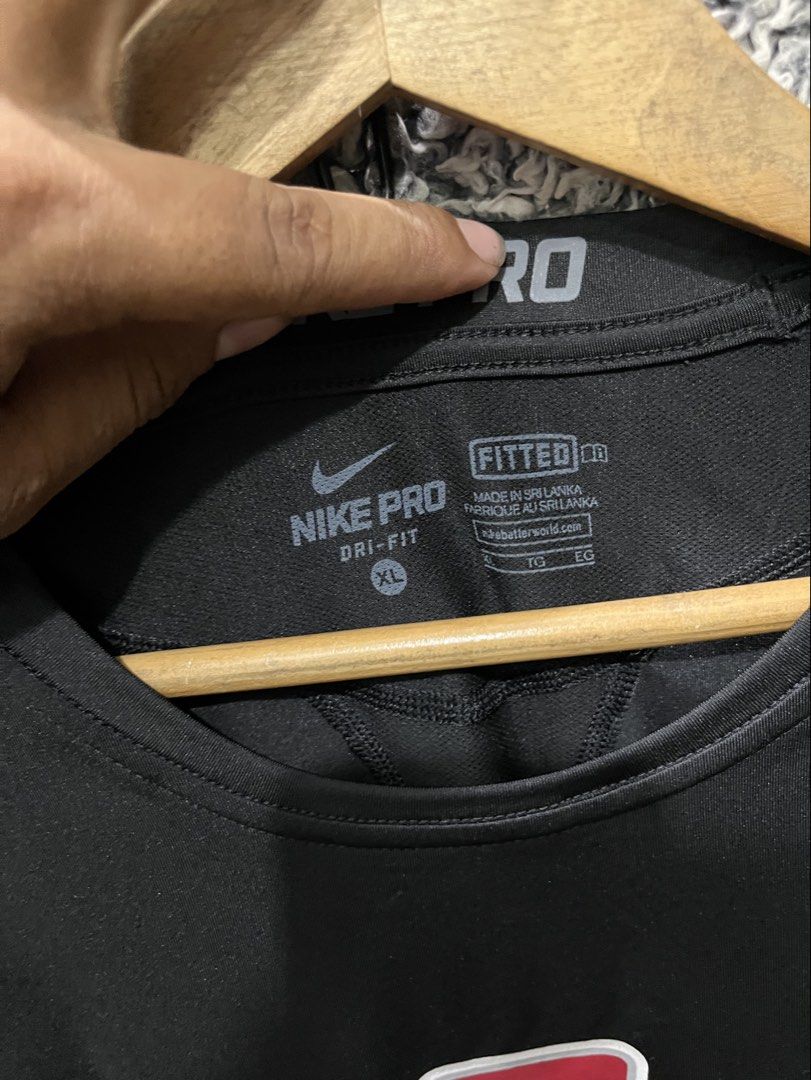 Nike Pro athletic t-shirt | Size XL (Category: Tshirts & Polo Shirts ) located in General Trias. Submitted by zrchustle.604 (Listing ID 1464626666, Image 3). Description: Nike Pro athletic t-shirt featuring the distinctive red and white interlock USC Trojans logo centered on the chest..