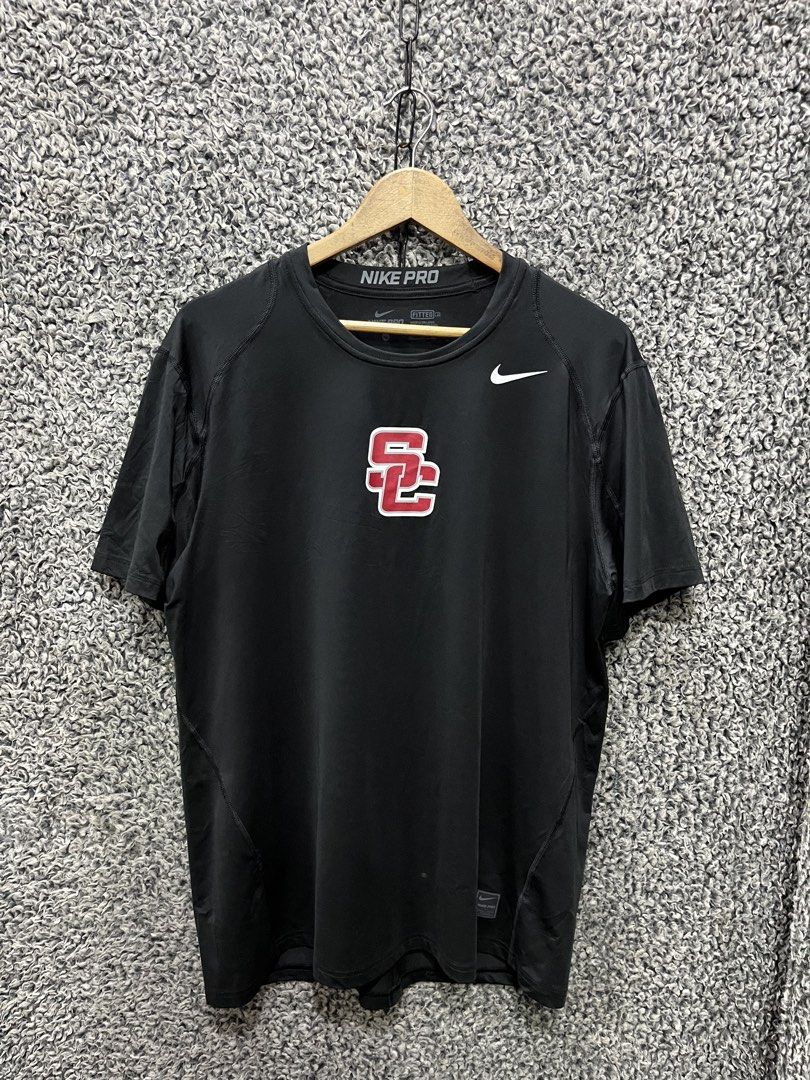 Nike Pro athletic t-shirt | Size XL (Category: Tshirts & Polo Shirts ) located in General Trias. Submitted by zrchustle.604 (Listing ID 1464626666, Image 1). Description: Nike Pro athletic t-shirt featuring the distinctive red and white interlock USC Trojans logo centered on the chest..