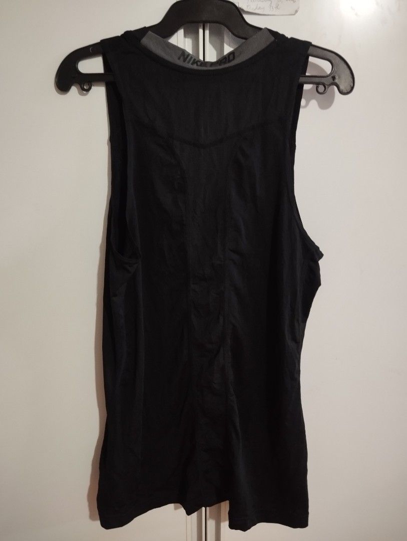 Nike Pro Dri-FIT Black Training Tank Top (Category: Activewear) located in Candon. Submitted by bernabepradoiii (Listing ID 1464580252, Image 3). Description: - Black Nike Pro Dri-FIT tank top - Ideal for workouts, training, gym, and running - Made with breathable fabric for maximum coolness - Iconic Nike swoosh logo - Comfortable fit for all active days.
