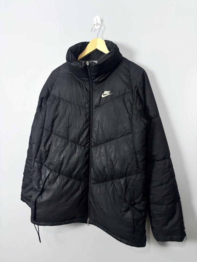 Nike Puffer Jacket Black Size M (Category: Coats, Jackets and Outerwear) located in Mabalacat. Submitted by doughnutthrift (Listing ID 1464661319, Image 2). Description: NIKE PUFFER JACKET Excellent condition W- 23” L- 29” Vintage condition, Puller .