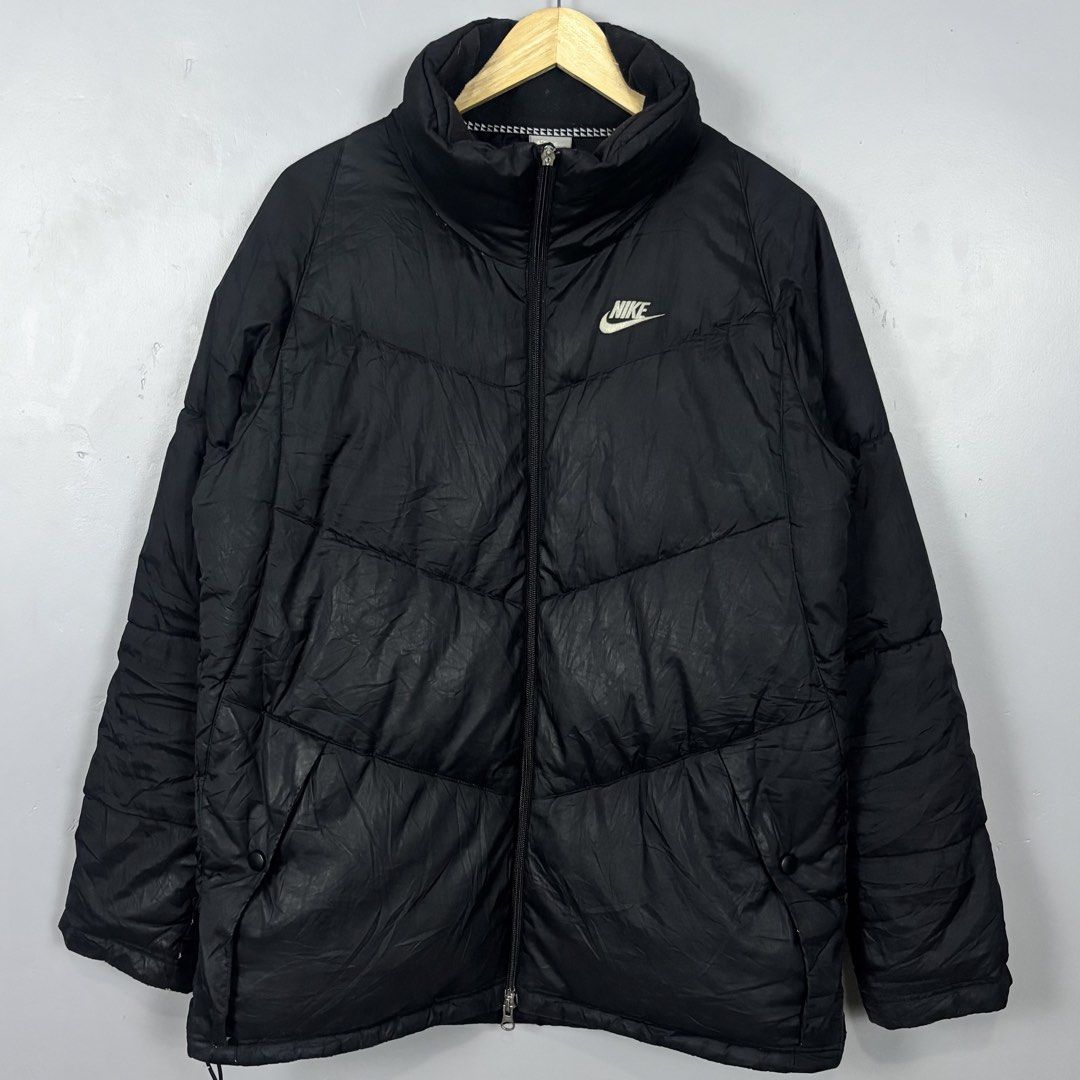 Nike Puffer Jacket Black Size M (Category: Coats, Jackets and Outerwear) located in Mabalacat. Submitted by doughnutthrift (Listing ID 1464661319, Image 1). Description: NIKE PUFFER JACKET Excellent condition W- 23” L- 29” Vintage condition, Puller .