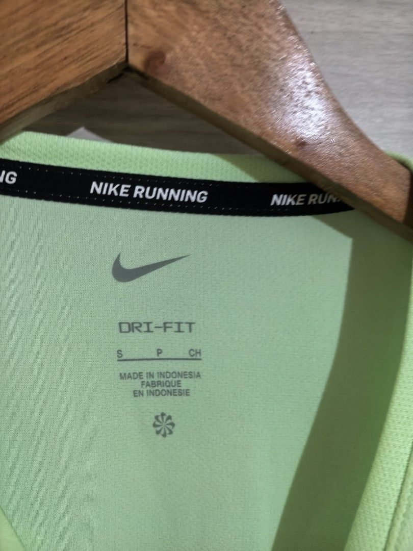 Nike Running Dri-FIT Neon Green Tee (Category: Activewear) located in Meycauayan. Submitted by preloved_items_j (Listing ID 1464738459, Image 2). Description: Width 19 inches Length 25 inches Used only once.