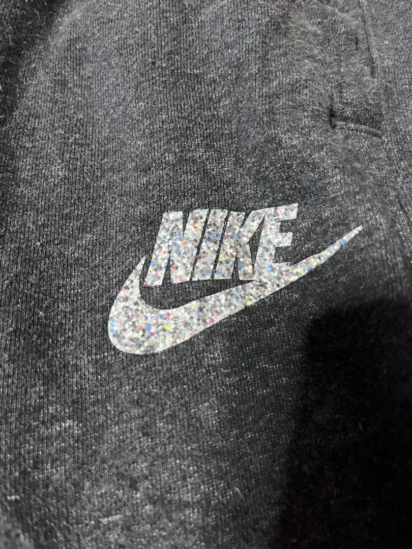NIKE SHORTS (Category: Shorts) located in Balingasag. Submitted by thriftkoto_83 (Listing ID 1464572478, Image 2). Description: Nike Sportswear Revival Fleece Shorts, featuring a distinct speckled Nike Grind logo on the leg.