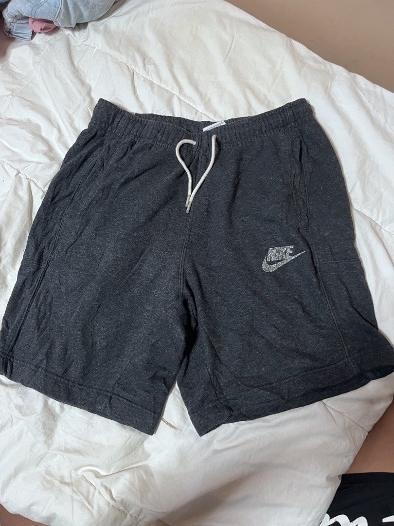 NIKE SHORTS (Category: Shorts) located in Balingasag. Submitted by thriftkoto_83 (Listing ID 1464572478, Image 1). Description: Nike Sportswear Revival Fleece Shorts, featuring a distinct speckled Nike Grind logo on the leg.