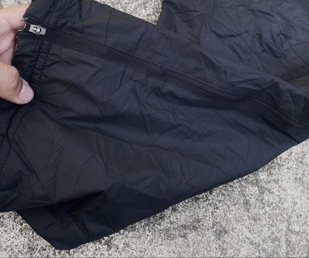 Nike Track Pants (Category: Joggers) located in Iba. Submitted by gotmethrift (Listing ID 1464583719, Image 3). Description: - Black Nike track pants - Size XL - Zippered side pockets - Elastic waistband with drawstring - Nike Fit Storm material - Ideal for workouts or casual wear - Made in China.
