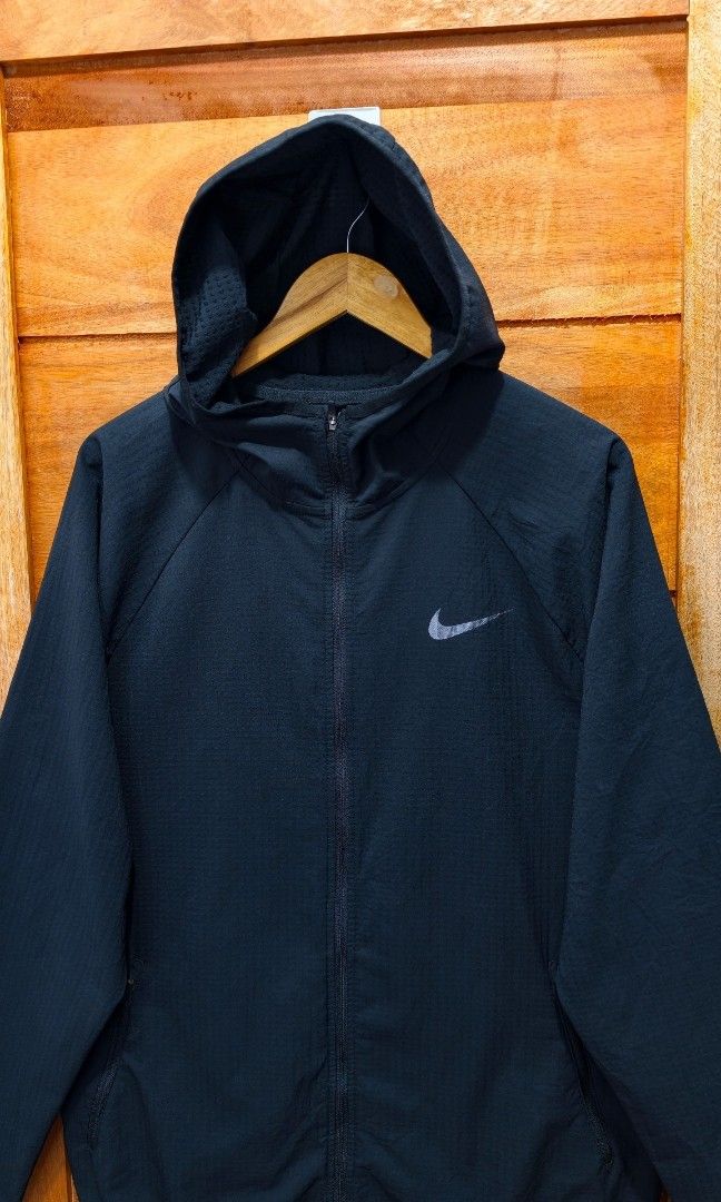 NIKE TRAINING LIGHTWEIGHT JACKET (BLACK) (Category: Coats, Jackets and Outerwear) located in Tabuk. Submitted by gooddropsofficial (Listing ID 1464638210, Image 3). Description: NIKE TRAINING LIGHTWEIGHT JACKET (BLACK) ZIPPER POCKETS ▪️WIDTH: 24" ▪️LENGTH: 29.5" ▪️SIZE: LARGE FIT ONLY ▪️COLOR RATE: 10/10 ▪️CONDITION: 10/10 ▪️ ISSUE: NONE ▪️ WASHED AND READY TO USE.