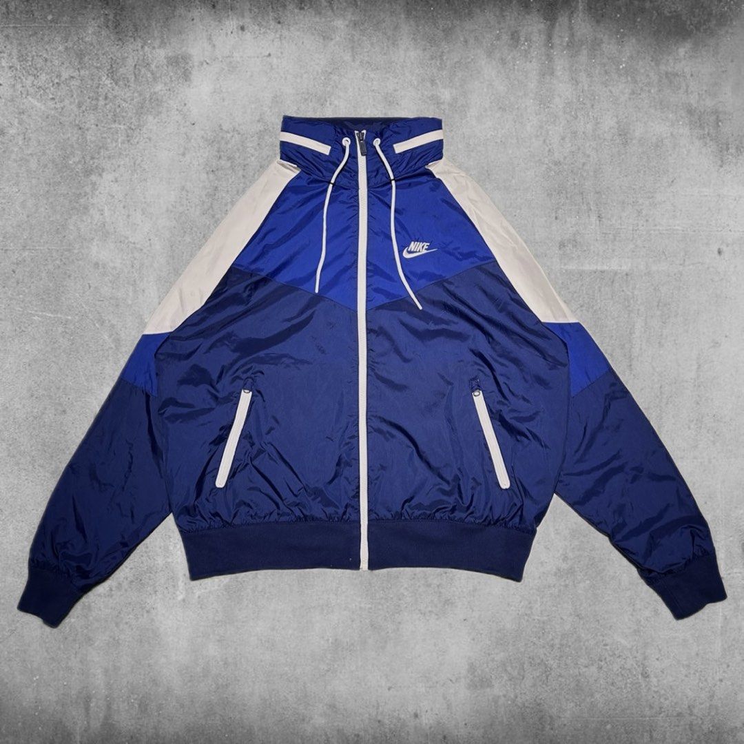 Nike Tritone Windbreaker (Category: Coats, Jackets and Outerwear) located in Angeles City. Submitted by 5am.collective (Listing ID 1464693885, Image 2). Description: Nike Tritone Windbreaker Packable Hood🥶 Dimensions: 24.5/27.5 (Large) Excellent Condition, Almost Flawless💙 PHP 1799 Only🏷️ 5AM Collective .