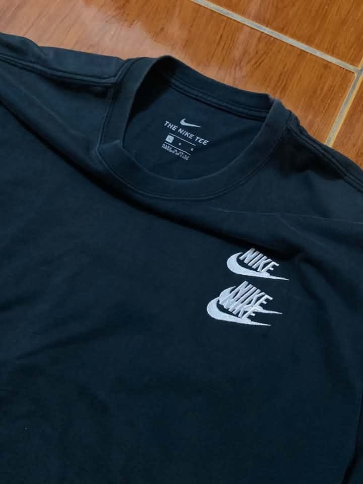 NIKE WORLD TOUR SHIRT (Category: Activewear) located in Bambang. Submitted by badobado.ph (Listing ID 1464577398, Image 2). Description: NIKE WORLD TOUR Size and Dimes: Fits Large | 20.5 Width - 28 Length Color rate:9/10 Condition: Excellent Issue: slight fade on end of the sleeve.