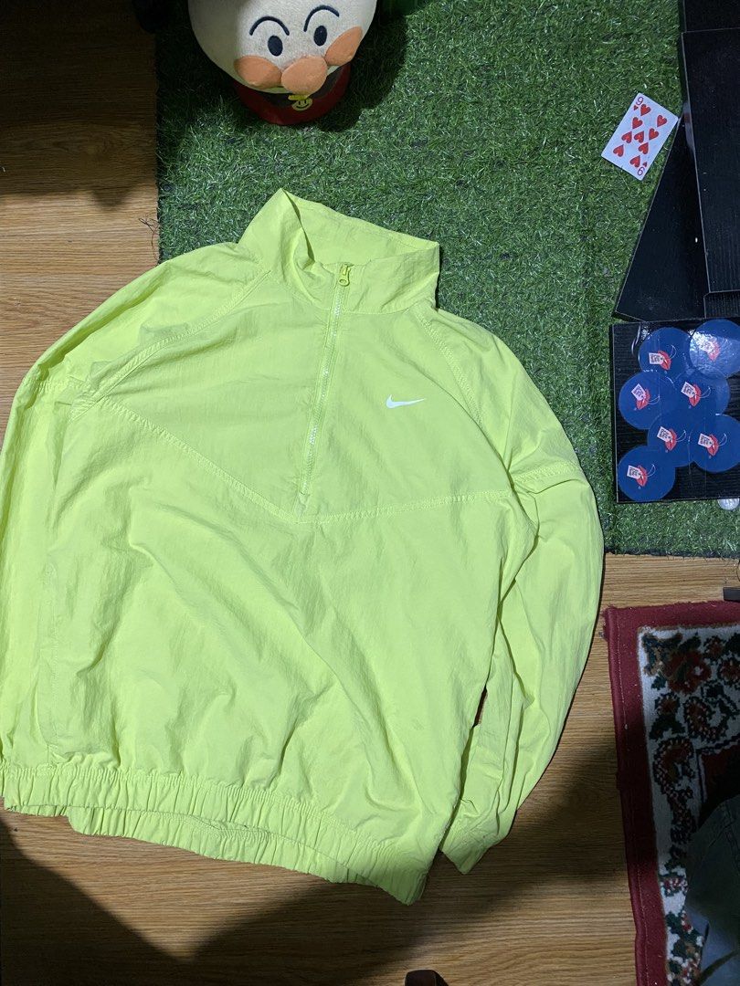 Nike x Stussy Windbreaker Jacket Lime Green (Category: Coats, Jackets and Outerwear) located in Baguio. Submitted by pickemup2600 (Listing ID 1464714858, Image 2). Description: - Brand: Nike x Stüssy - Item: Lightweight nylon windbreaker - Color: Vibrant lime green - Size: Small (Tag intact) best fit medium to large - Details: Half-zip closure, high collar, elasticated cuffs and hem - Branding: White Nike Swoosh on front, large Stüssy graffiti lo