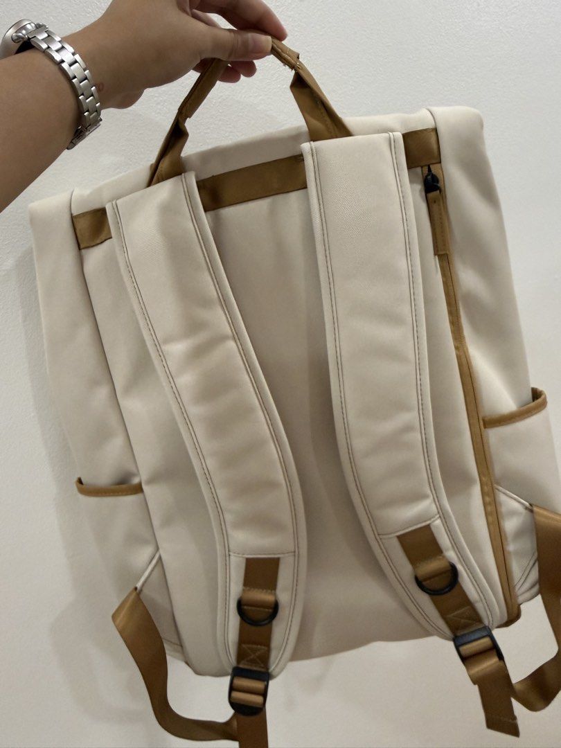 NINETYGO Beige Canvas Backpack with Brown Leather Accents (Category: Backpacks) located in Paranaque City. Submitted by majamili (Listing ID 1464676437, Image 2). Description: Unsealed but never been used! Got this as a gift pero never ko talaga nagamit, naka tago lang. SRP: ₱1,990 Material: Fabric IP Rating: Anti-splash Dimension: 440 x 300 x 150 mm 700g Special Features: Large capacity with multiple compartments and pockets for all-day use Fits