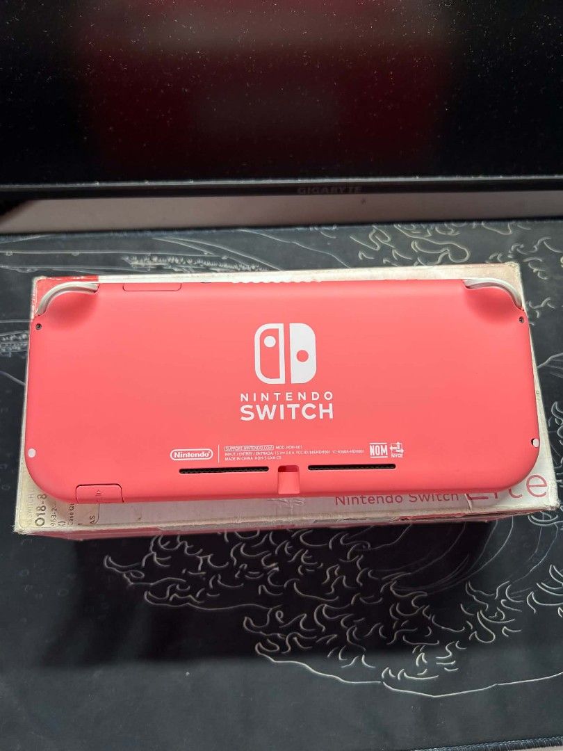 Nintendo switch lite (Category: Nintendo) located in Malasiqui. Submitted by justinfe (Listing ID 1464666713, Image 3). Description: 🎮 Nintendo Switch Lite Coral Pink — ₱6,500 • Good condition — 9/10 • Fully functional • No joystick drift • Complete with box & charger • Clean & reset • With digital games 📍 Pangasinan 🤝 Meet-up preferred 📦 COD/COP available PM if interested. Serious buyers only..