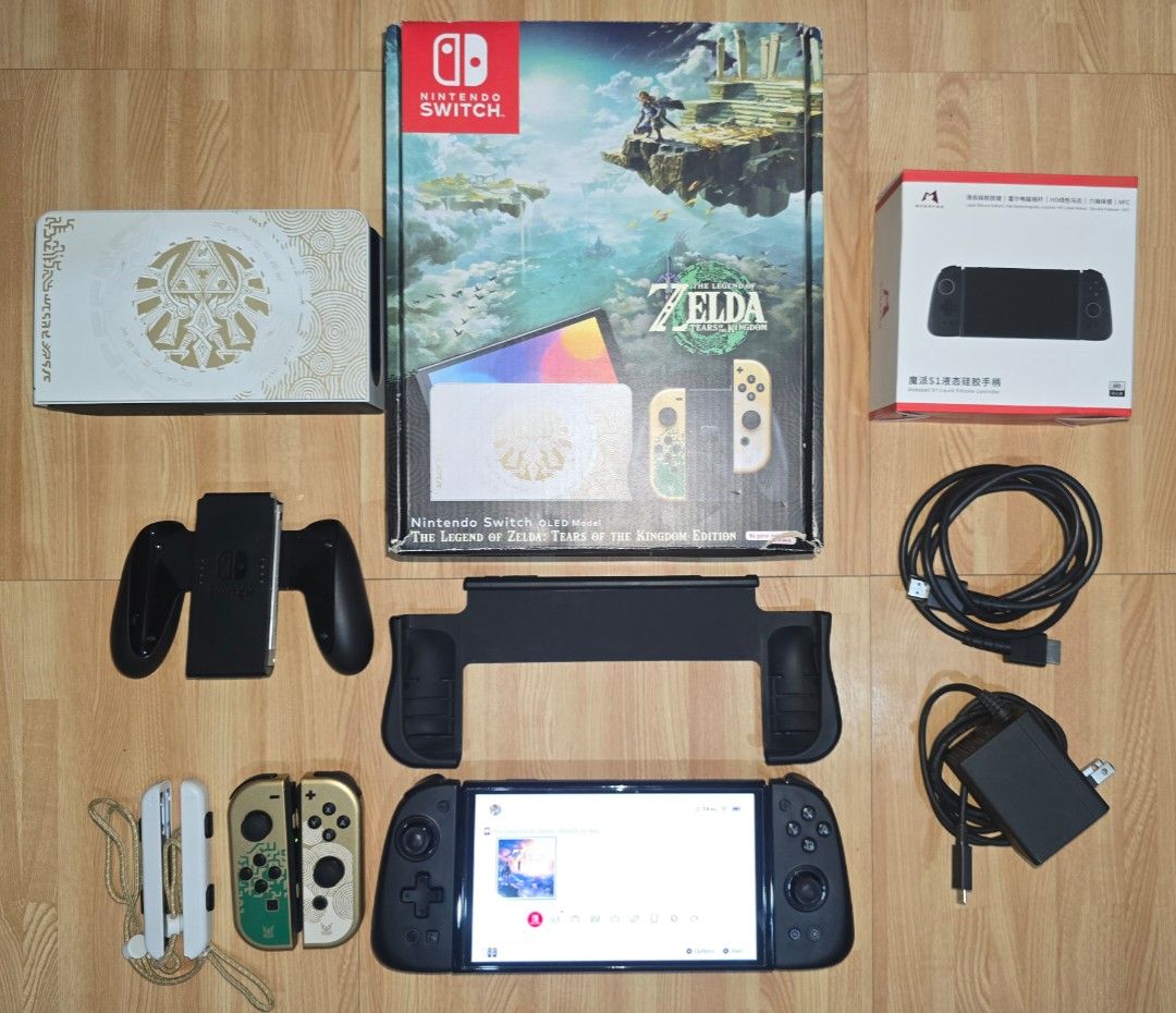 Nintendo Switch OLED - Zelda TOTK Edition (Category: Nintendo) located in Cebu City. Submitted by _ctrl (Listing ID 1464736939, Image 1). Description: FS Nintendo Switch OLED - Zelda TOTK Edition Good condition Complete set with box Inclusions: - Original charger - dock - hdmi - joycon grip - joycon straps - Mobapad S1 HD Controller - Switch Grip Case - 4 Controller Charging Dock Station Physical game: Zelda Breath of the wild (cartridge only, no