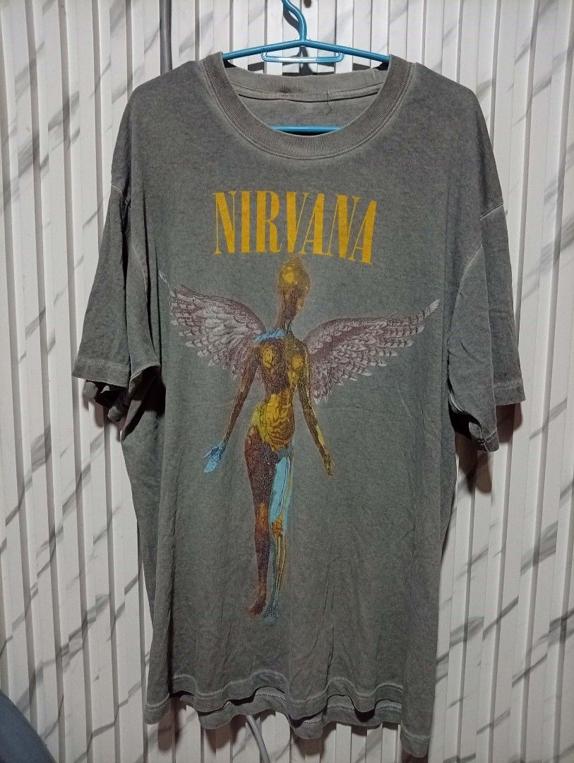 Nirvana Angel In Utero Wash Gray ( dated 1993 ) (Category: Tshirts & Polo Shirts ) located in Barotac Nuevo. Submitted by john.pritz (Listing ID 1464687156, Image 1). Description: Nirvana Angel In Utero Wash gray ( Dated 1993 ) excellent condi No side Sem issue hole ( see the pic ) width 22 to 23 Length 30.