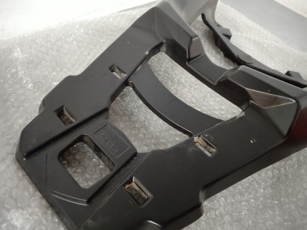 NMax V2 Bracket (Category: Body Parts and Accessories) located in Valenzuela. Submitted by pjadg02 (Listing ID 1464696428, Image 2). Description: - for Yamaha NMax V2 - Still in a Good Condition - Durable black motorcycle rear rack and luggage carrier - Sturdy plate designed for top boxes - All mounting holes and slots are fully intact - Shows minor scuffs from previous installation and normal use - Ready to mount and use on your bike RFS: Declut