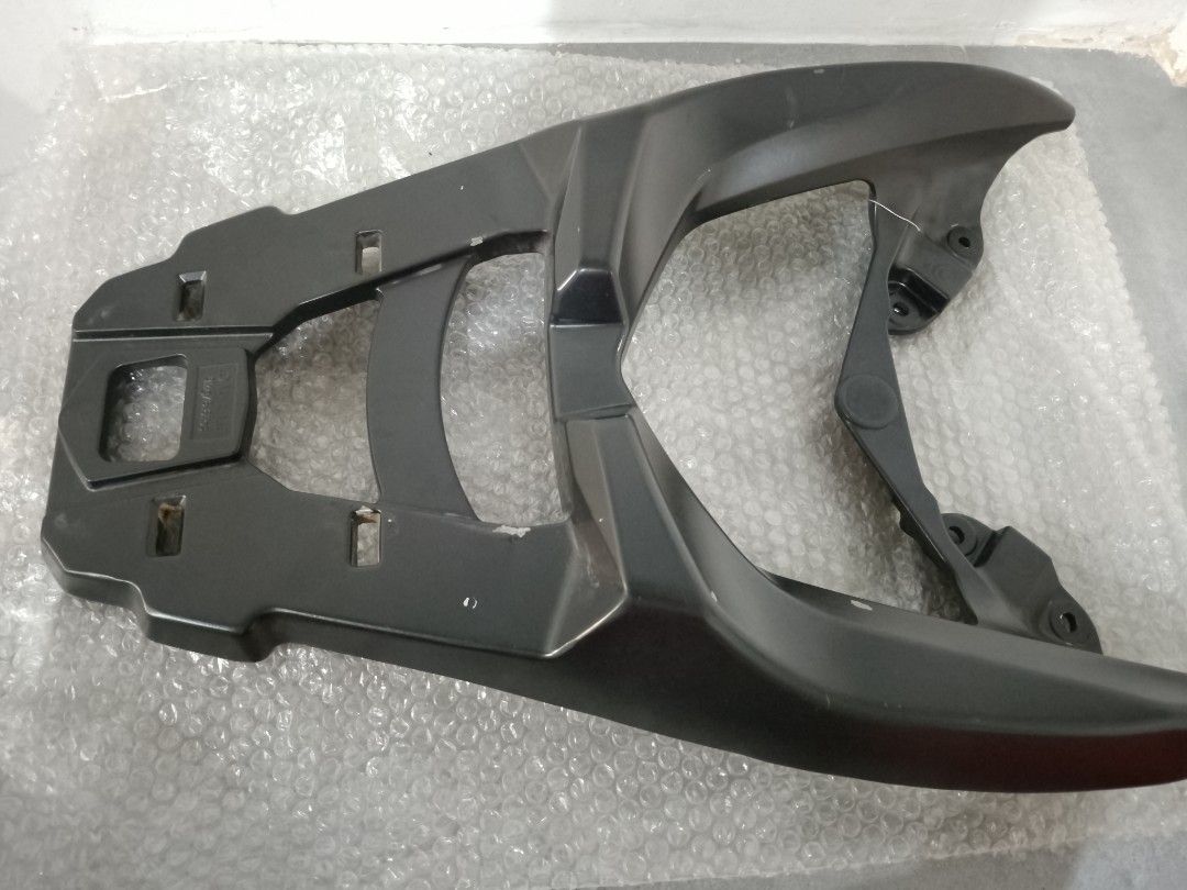 NMax V2 Bracket (Category: Body Parts and Accessories) located in Valenzuela. Submitted by pjadg02 (Listing ID 1464696428, Image 3). Description: - for Yamaha NMax V2 - Still in a Good Condition - Durable black motorcycle rear rack and luggage carrier - Sturdy plate designed for top boxes - All mounting holes and slots are fully intact - Shows minor scuffs from previous installation and normal use - Ready to mount and use on your bike RFS: Declut