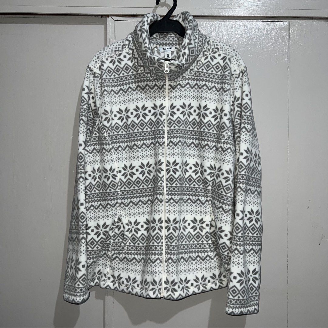 Old Navy Fleece Zip-Up Jacket (Category: Coats, Jackets and Outerwear) located in Makati City. Submitted by b5closet (Listing ID 1464641978, Image 1). Description: - Old Navy Fleece Zip-up jacket - Size XXL - Length: 27 inches - Width: 26 inches - Grey and white snowflake pattern - Full zip front - Turtle neck collar - 2 front pockets - Ideal for layering on chilly days NOTE: - Condition : Excellent ‼️ - Never used ‼️ - GCASH and BDO MOP - SF wil