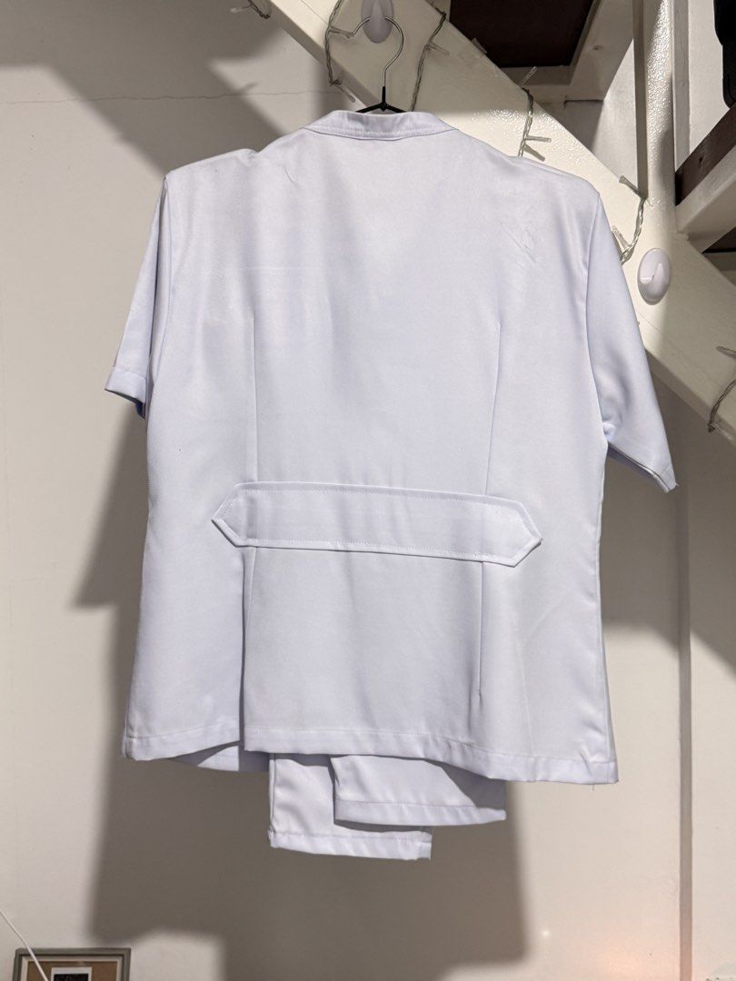 OLFU Nursing Uniform set (Category: Sets or Coordinates) located in Rizal. Submitted by gwencd17 (Listing ID 1464637378, Image 2). Description: used once for board exam no school patch measurements in inches pants (garterized waistband at the back) waist - 34 length - 38 front rise - 11 back rise - 13.5 upper thigh - 12.5 leg opening - 6.5 inches top chest - 16 waist - 17.5 length - 24 sleeve - 8.5 .