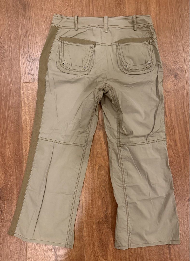 Olive green Unitarian pants (Category: Other Bottoms) located in Paranaque City. Submitted by bbyooodaa (Listing ID 1464636875, Image 2). Description: Low-waisted olive green pants with pockets and zippers .