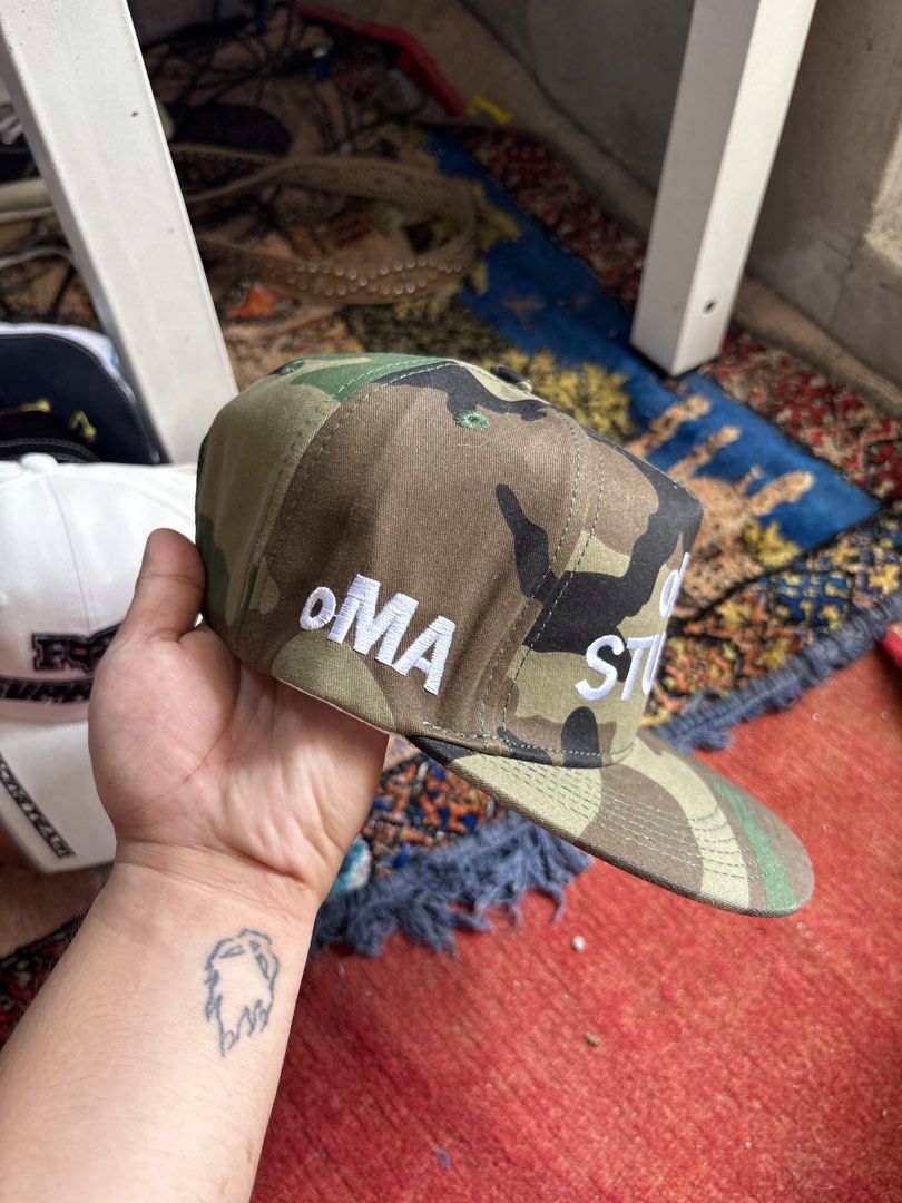 oMA STUDIOS Camouflage Cap (Category: Caps & Hats) located in Pasay City. Submitted by namastenamstenamaste (Listing ID 1464589203, Image 2). Description: oMA STUDIOS Camo Bnew with tag +sf.